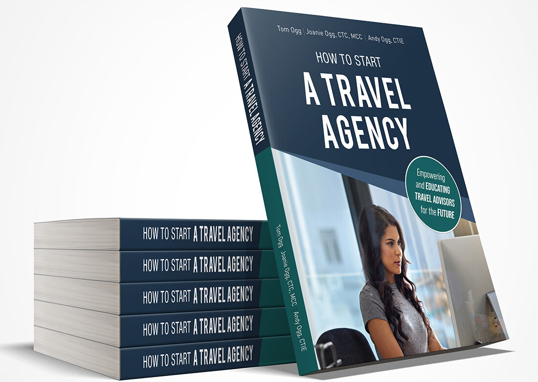 Stack of “How to Start a Travel Agency” books showcasing the updated 2026 edition for travel entrepreneurs