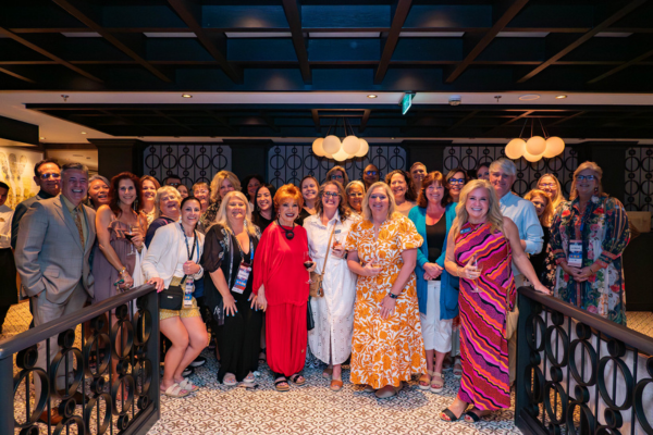 Group of travel advisors posing together during KHM Travel Group Crystal Conference gathering