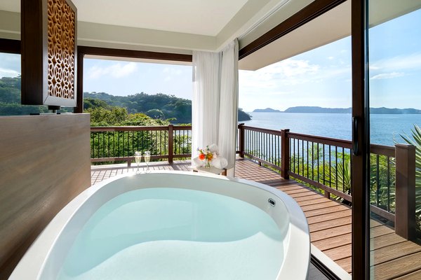 Private balcony soaking tub with ocean views at Secrets Papagayo