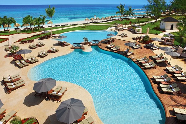Pool and beachfront at Secrets St. James Montego Bay