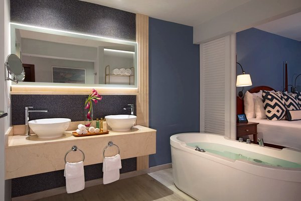 Suite bathroom with soaking tub at Secrets St. James Montego Bay