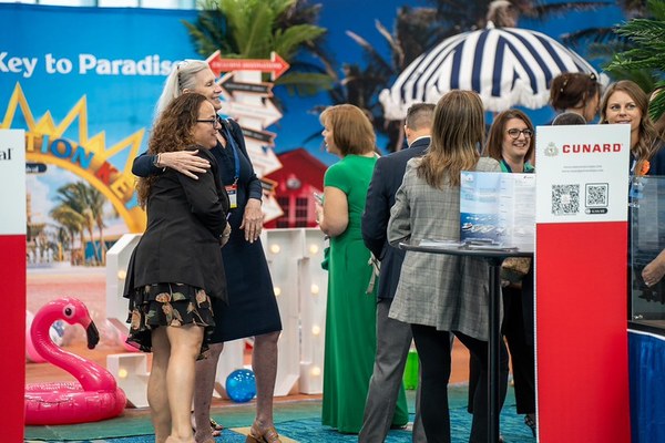 Travel advisors networking and connecting with suppliers on the CruiseWorld show floor
