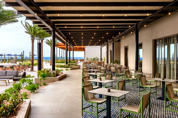 Open-air dining terrace at Secrets Baby Beach Aruba
